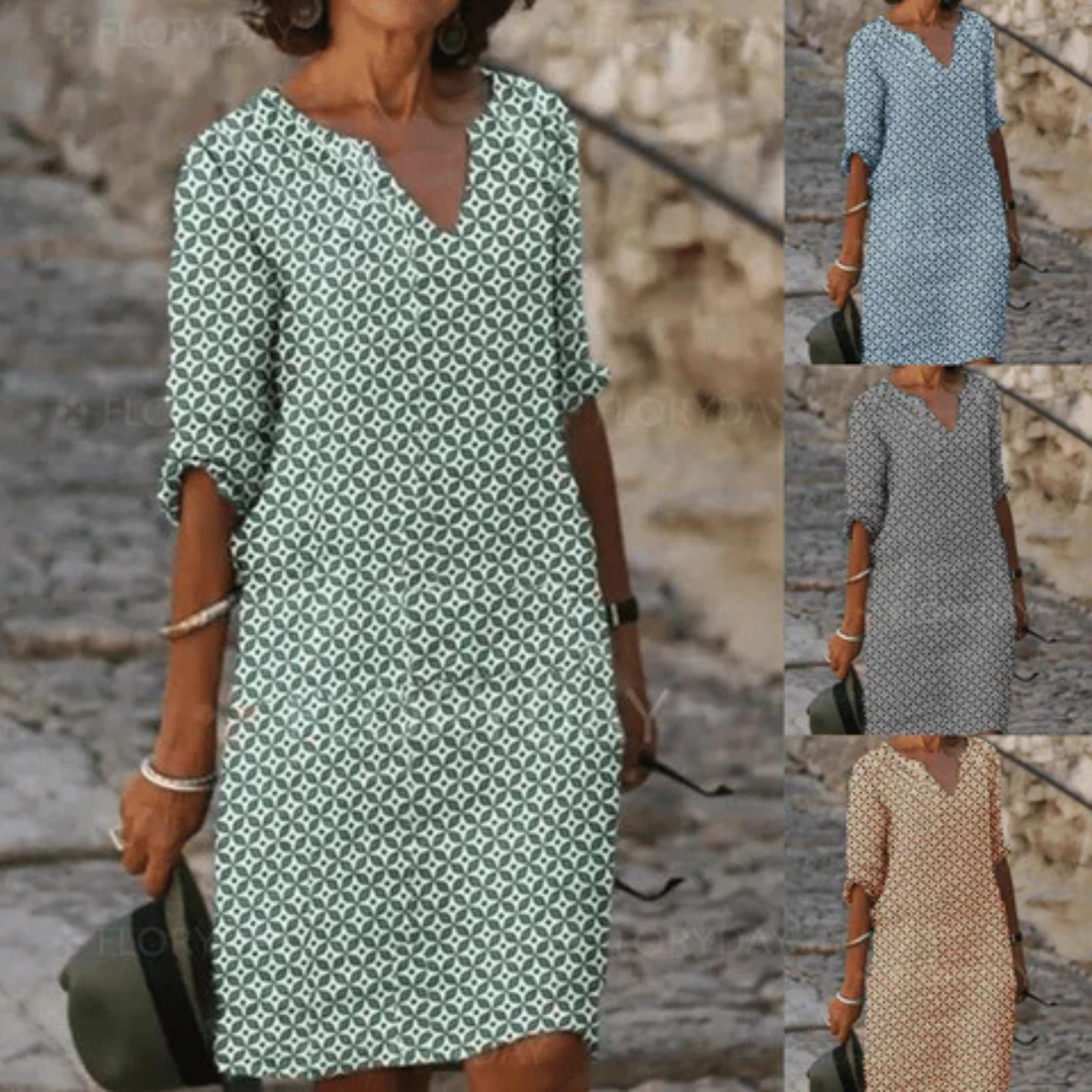 "Robe midi femme fluide et confortable pour l'été, coupe ample, tissu léger, idéale pour sorties estivales."