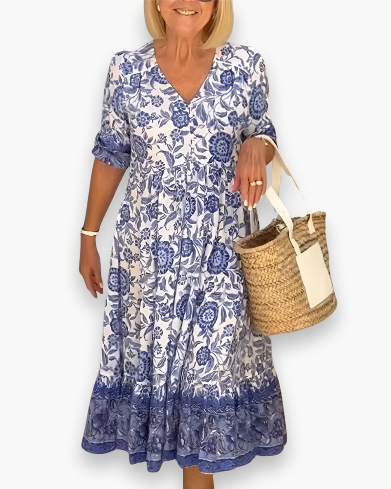 "Robe midi fleurie élégante, col V, motifs floraux raffinés, coupe fluide, femme, quotidien ou événements spéciaux."