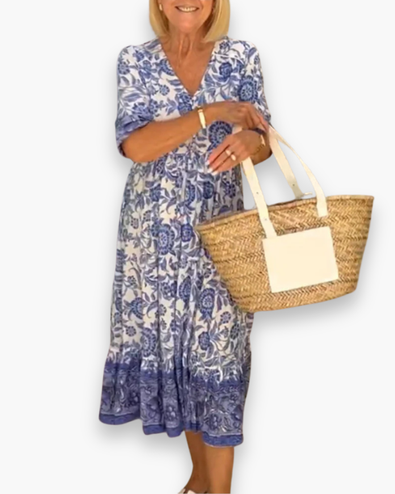 "Robe midi fleurie élégante, col V, motifs floraux raffinés, coupe fluide, femme, quotidien ou événements spéciaux."