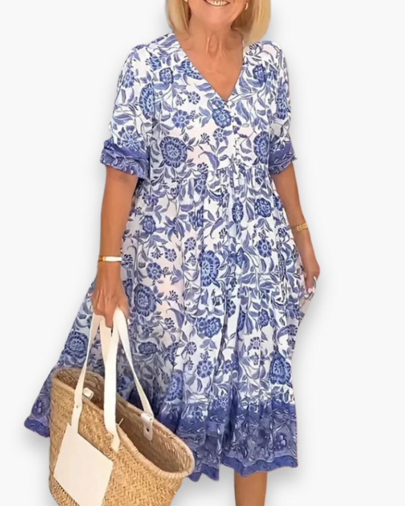 "Robe midi fleurie élégante, col V, motifs floraux raffinés, coupe fluide, femme, quotidien ou événements spéciaux."
