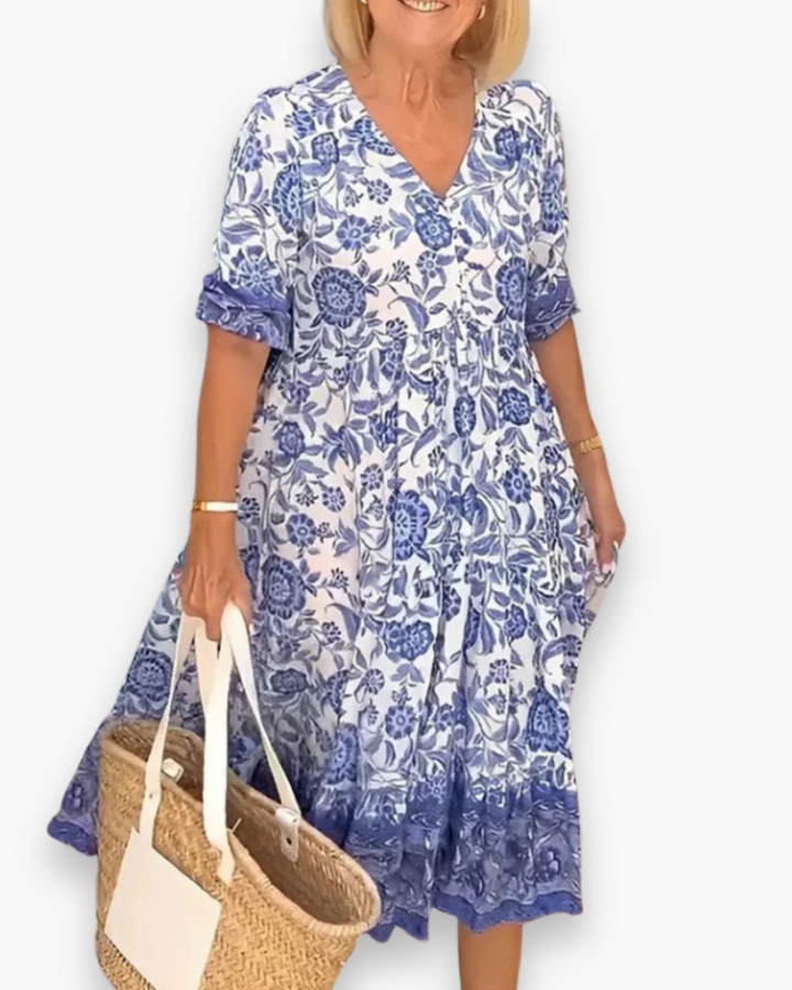 "Robe midi fleurie élégante, col V, motifs floraux raffinés, coupe fluide, femme, quotidien ou événements spéciaux."