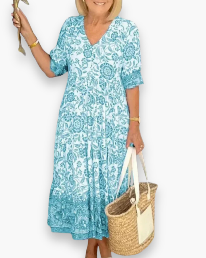 "Robe midi fleurie élégante, col V, motifs floraux raffinés, coupe fluide, femme, quotidien ou événements spéciaux."