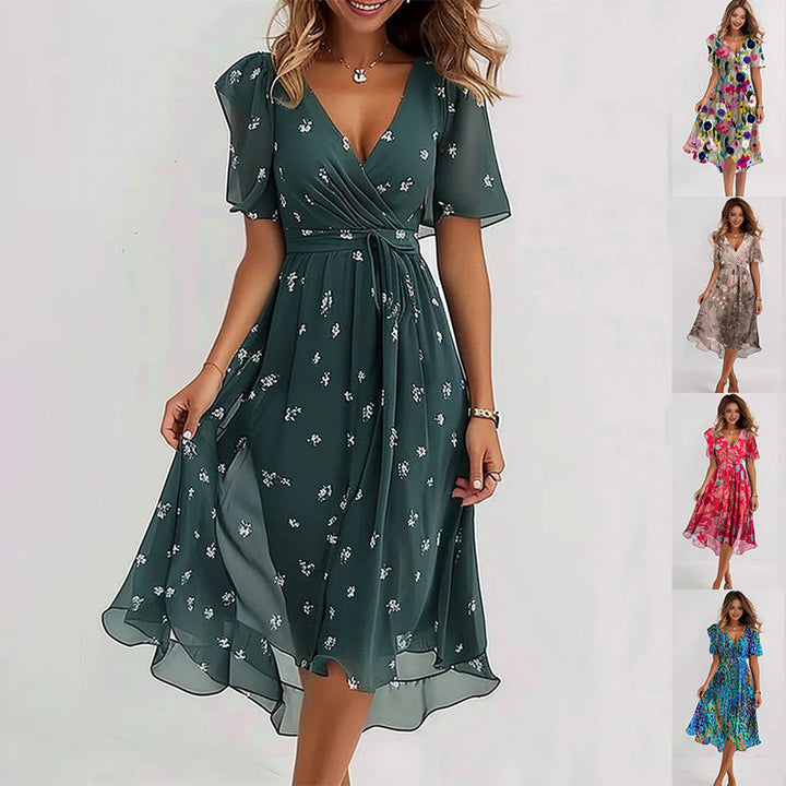 "Robe midi florale élégante, imprimé délicat, coupe fluide, style féminin, parfait pour une allure gracieuse et intemporelle.