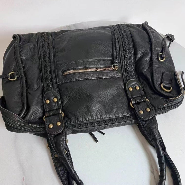 "Sac à bandoulière cuir véritable marron vintage élégant, accessoire femme chic et intemporel, design classique et durable."