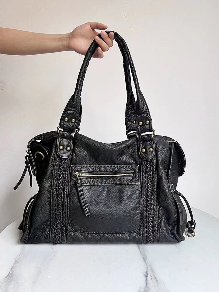 "Sac à bandoulière cuir véritable marron vintage élégant, accessoire femme chic et intemporel, design classique et durable."