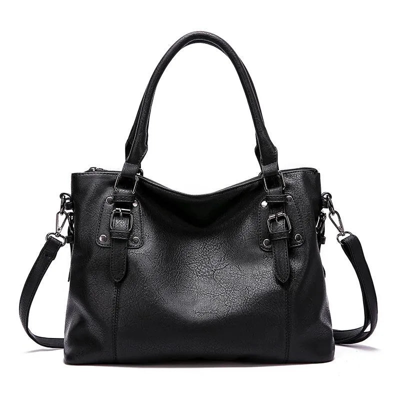 Sac à bandoulière en cuir véritable brun, élégant et résistant, avec sangle réglable pour un style chic et durable.