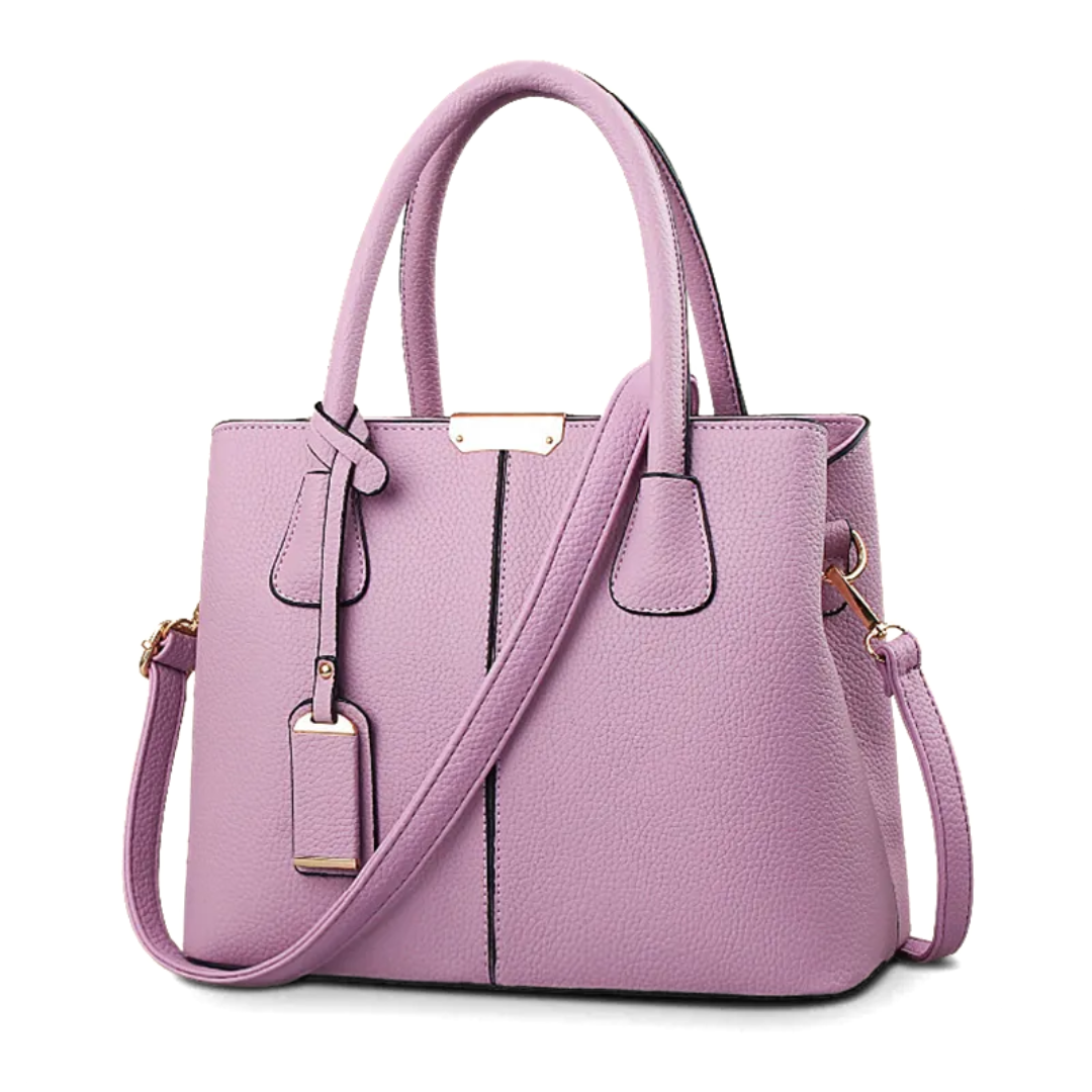 "Sac à bandoulière violet élégant et spacieux pour femme, avec sangle réglable et design intemporel, vue de face."