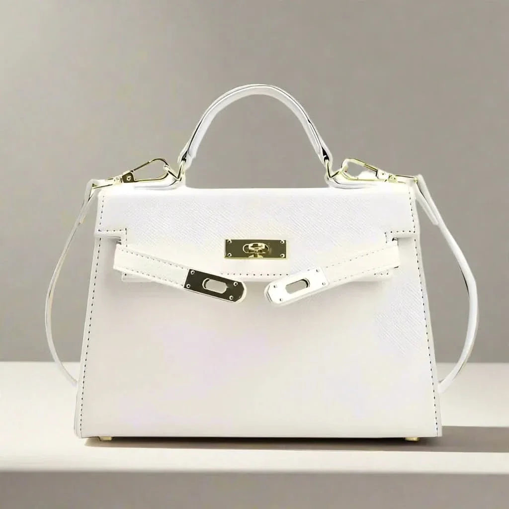Sac à main élégant femme, noir moderne, design raffiné, compartiments pratiques, parfait bureau ou soirée.