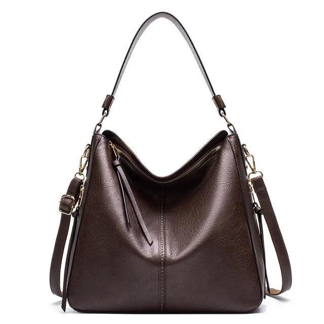 "Sac à main Hobo en cuir pour femme, design spacieux et lignes douces, couleur élégante, chic et fonctionnel."