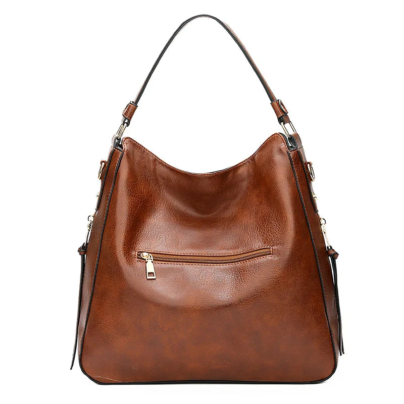 "Sac à main Hobo en cuir pour femme, design spacieux et lignes douces, couleur élégante, chic et fonctionnel."