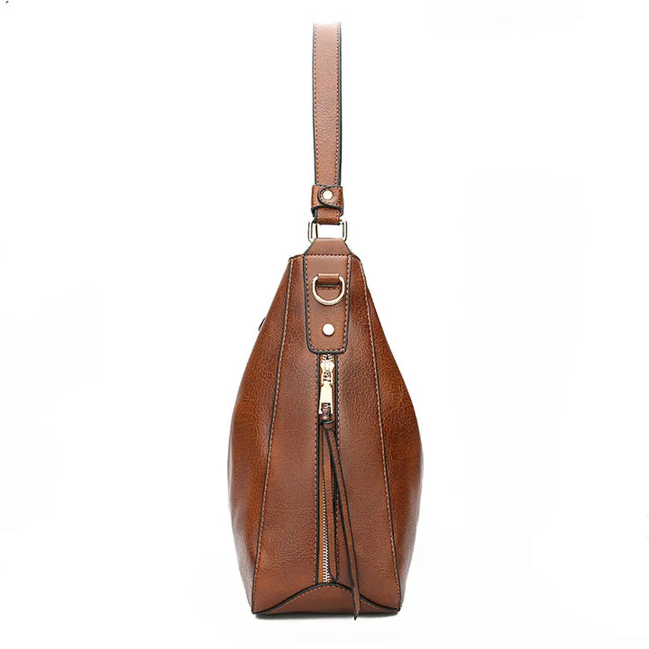 "Sac à main Hobo en cuir pour femme, design spacieux et lignes douces, couleur élégante, chic et fonctionnel."