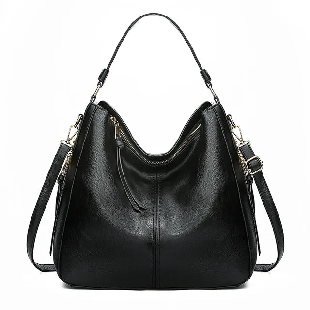 "Sac à main Hobo en cuir pour femme, design spacieux et lignes douces, couleur élégante, chic et fonctionnel."
