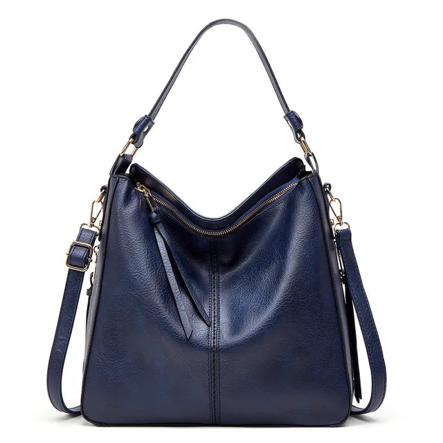 "Sac à main Hobo en cuir pour femme, design spacieux et lignes douces, couleur élégante, chic et fonctionnel."