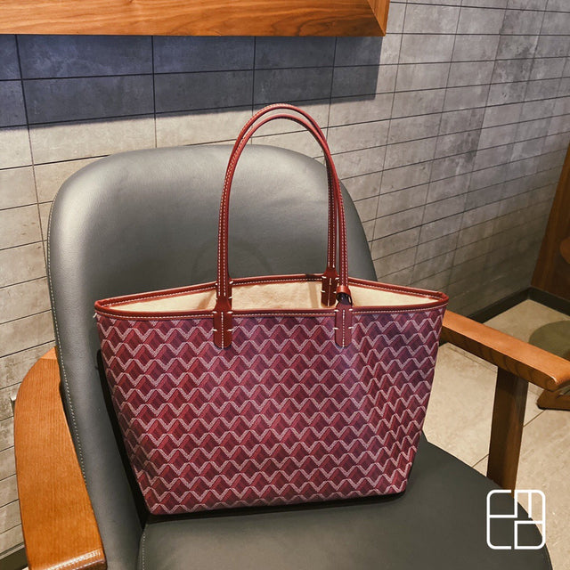 "Sac à main shopper luxe, élégant et pratique, design épuré, avec anses confortables en finition haute qualité."