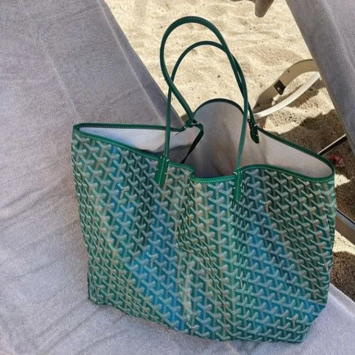 "Sac à main shopper luxe, élégant et pratique, design épuré, avec anses confortables en finition haute qualité."