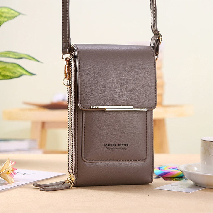 Sac bandoulière compact en cuir PU végétalien, élégant et moderne, pour femme, disponible en huit couleurs tendance.