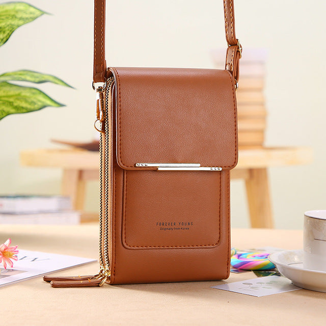 Sac bandoulière compact en cuir PU végétalien, élégant et moderne, pour femme, disponible en huit couleurs tendance.