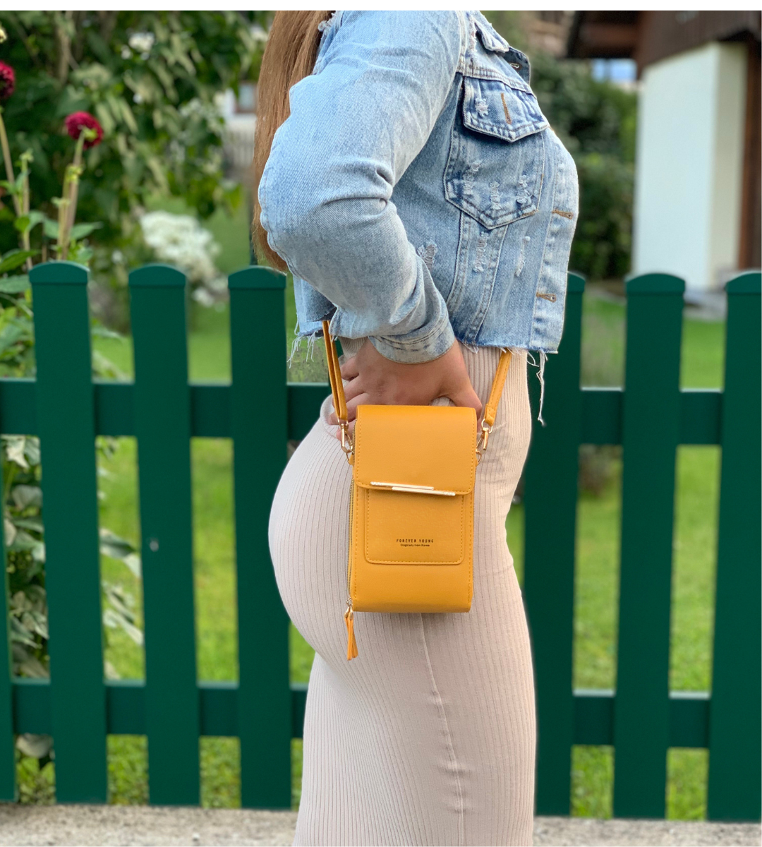 Sac bandoulière compact en cuir PU végétalien, élégant et moderne, pour femme, disponible en huit couleurs tendance.