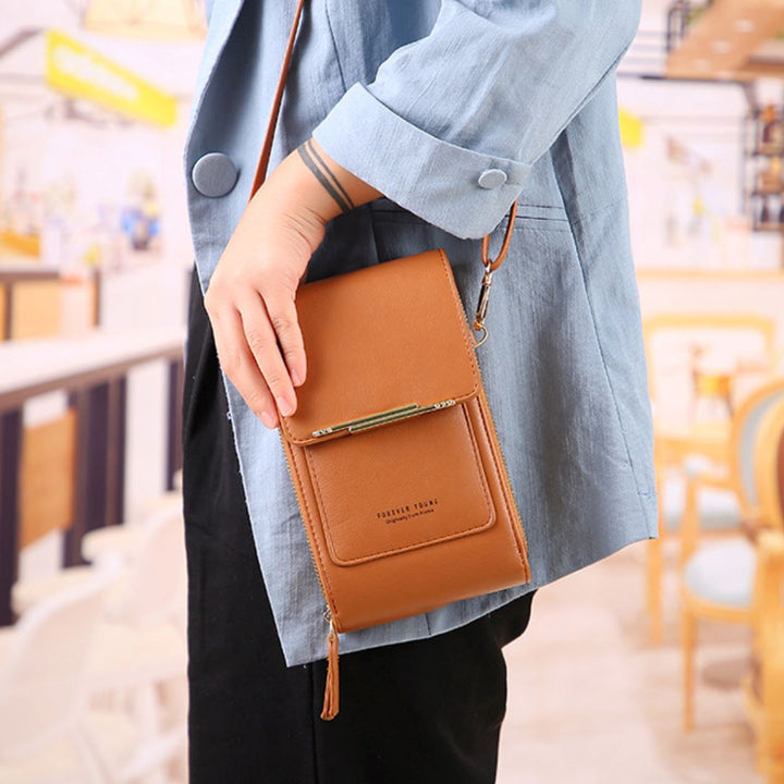 Sac bandoulière compact en cuir PU végétalien, élégant et moderne, pour femme, disponible en huit couleurs tendance.