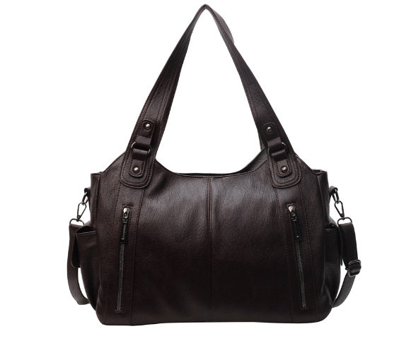 "Sac bandoulière femme Dakota en cuir synthétique, élégant, spacieux, bandoulière ajustable, vue de face, chic minimaliste"