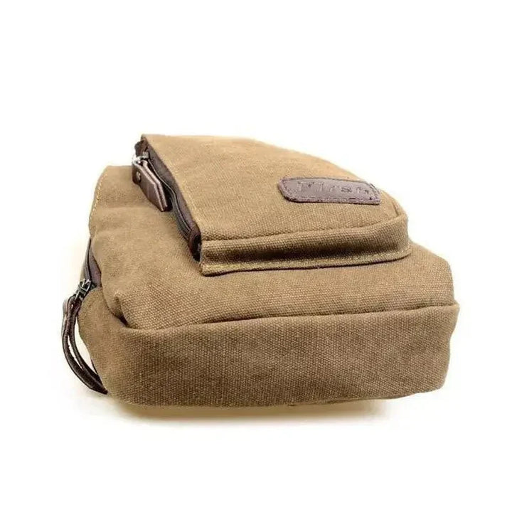 "Sac bandoulière robuste en toile ajustable, design élégant et confort optimal pour activités extérieures et urbaines."