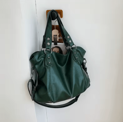 "Sac cabas en cuir PU souple noir, élégant et spacieux, avec fermeture zippée et bandoulière pour un style pratique."
