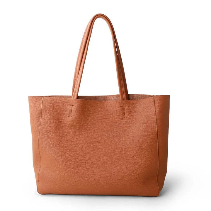 "Sac cabas en cuir véritable noir, élégant et spacieux, accessoire femme moderne."
