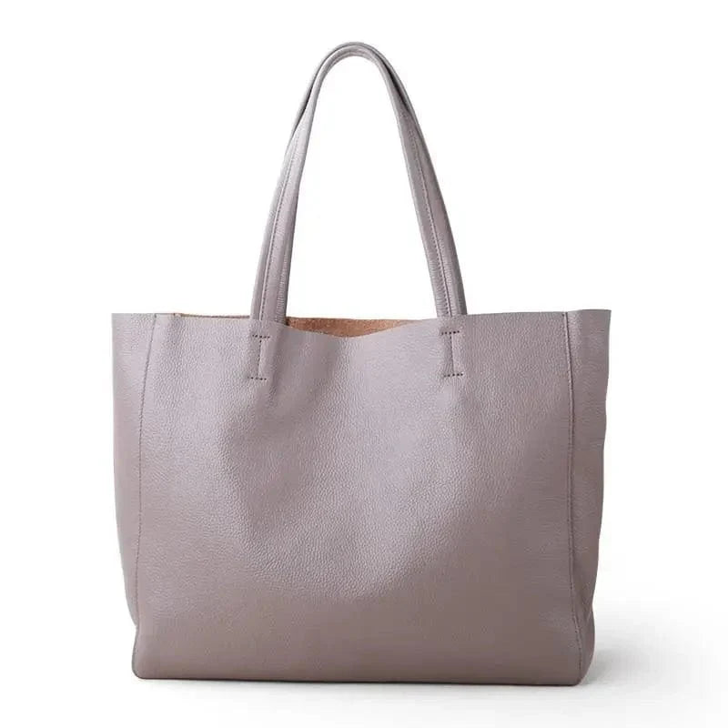"Sac cabas en cuir véritable noir, élégant et spacieux, accessoire femme moderne."