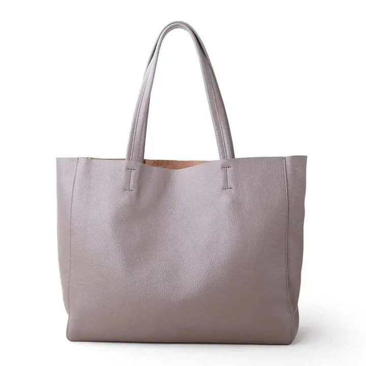 "Sac cabas en cuir véritable noir, élégant et spacieux, accessoire femme moderne."
