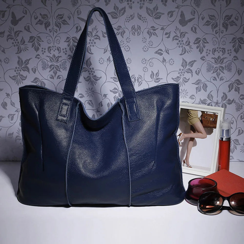 Sac cabas grand format en cuir souple camel avec fermeture zippée, idéal pour femme moderne et élégante.