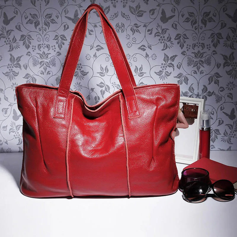 Sac cabas grand format en cuir souple camel avec fermeture zippée, idéal pour femme moderne et élégante.