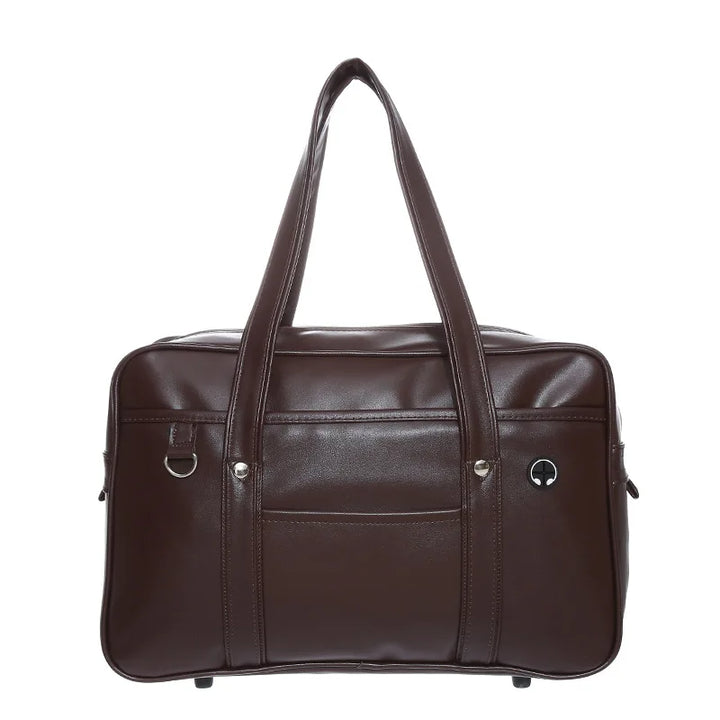 Sac cabas stylé pour lycéennes, cuir PU noir, spacieux, avec compartiment ordinateur portable et poches pratiques.