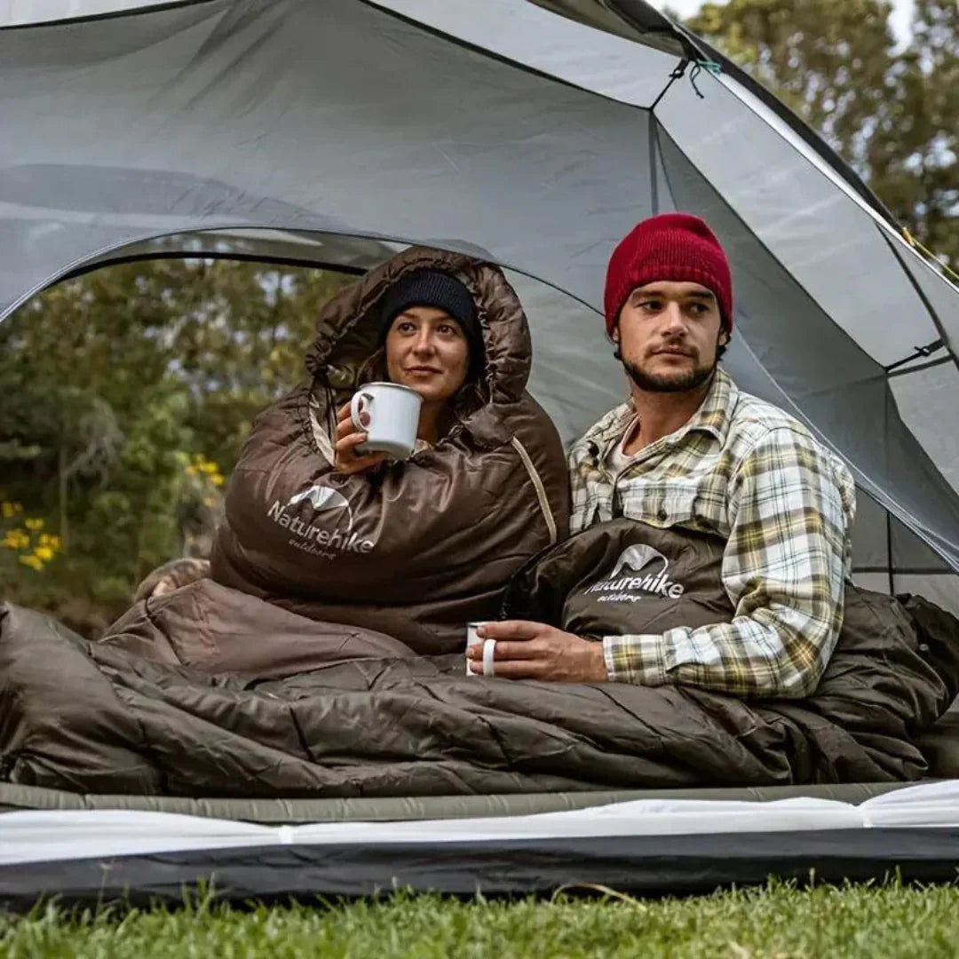"Sac de couchage outdoor ultraléger gris, design ergonomique, isolation thermique optimale pour camping et trek."