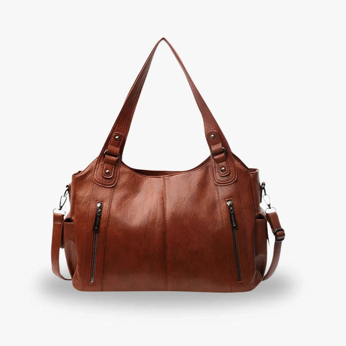 Sac d'école à bandoulière en cuir végétal lisse, design élégant, couleur classique, idéal pour femmes modernes.