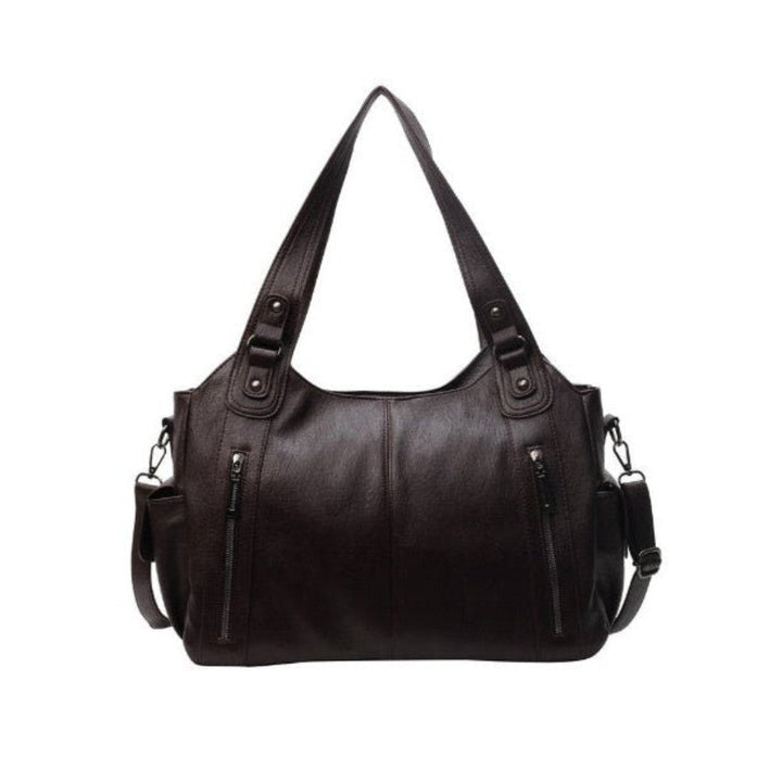 Sac d'école à bandoulière en cuir végétal lisse, design élégant, couleur classique, idéal pour femmes modernes.