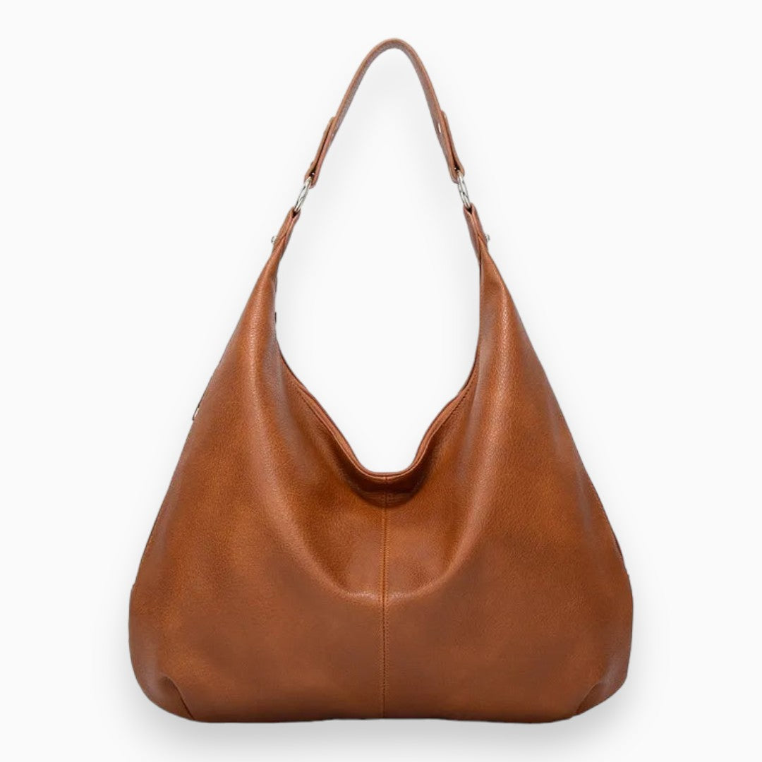 Sac hobo chic et spacieux en cuir camel, design souple et moderne, idéal pour accessoires femmes urbaines et élégantes.