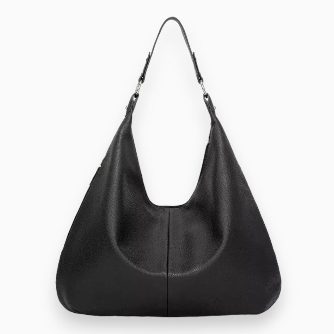 Sac hobo chic et spacieux en cuir camel, design souple et moderne, idéal pour accessoires femmes urbaines et élégantes.