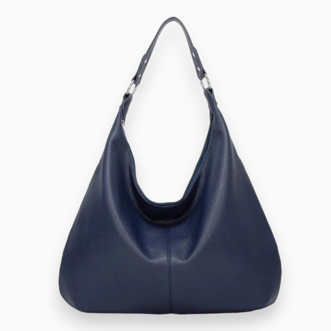 Sac hobo chic et spacieux en cuir camel, design souple et moderne, idéal pour accessoires femmes urbaines et élégantes.