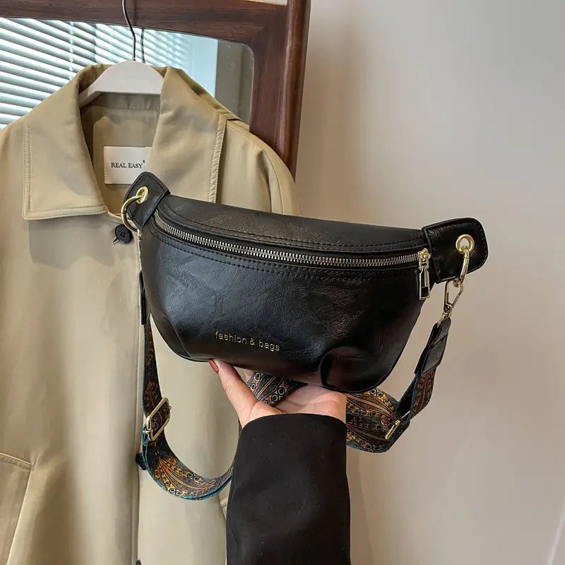 Sacoche banane en cuir végétal pour femme, design élégant, marron cognac, bandoulière ajustable pour un style raffiné.