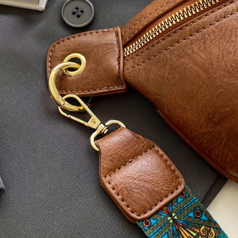 Sacoche banane en cuir végétal pour femme, design élégant, marron cognac, bandoulière ajustable pour un style raffiné.