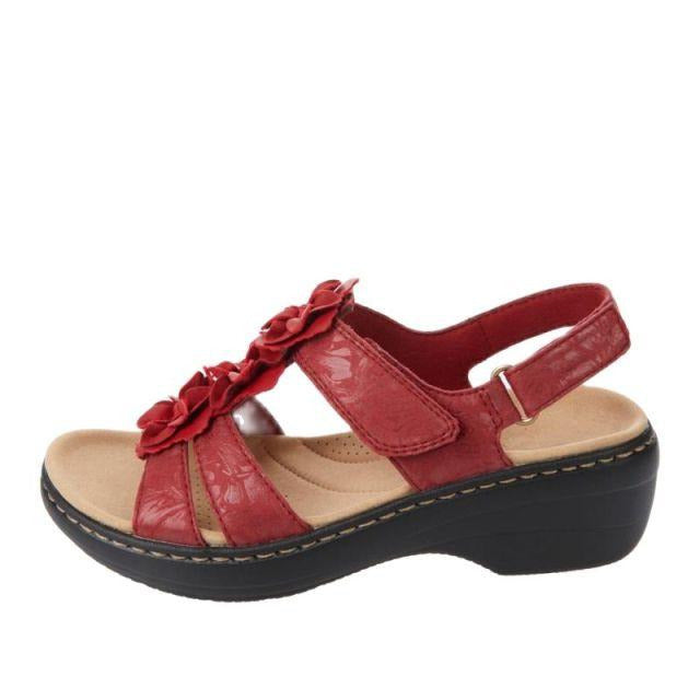 Sandales compensées Burdeos pour femmes avec semelle orthopédique, design ouvert et talon stable pour confort et élégance.
