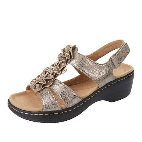 Sandales compensées Burdeos pour femmes avec semelle orthopédique, design ouvert et talon stable pour confort et élégance.