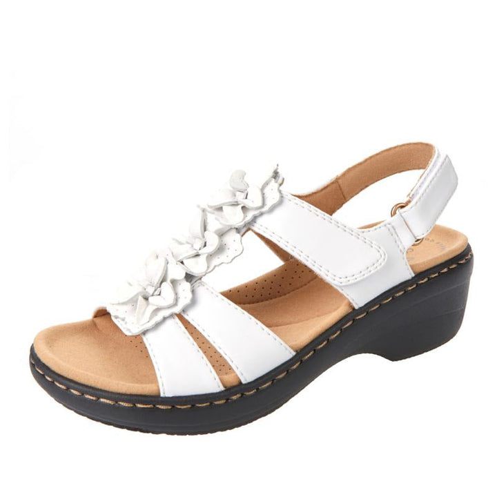 Sandales compensées Burdeos pour femmes avec semelle orthopédique, design ouvert et talon stable pour confort et élégance.