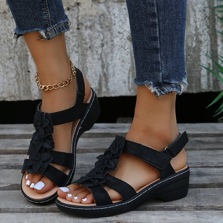 Sandales compensées Burdeos pour femmes avec semelle orthopédique, design ouvert et talon stable pour confort et élégance.