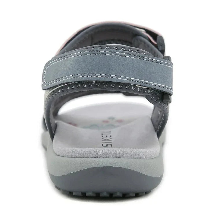 Sandales confort femme, scratch ajustable, semelle antidérapante caoutchouc, tige respirante design moderne, vue de profil.
