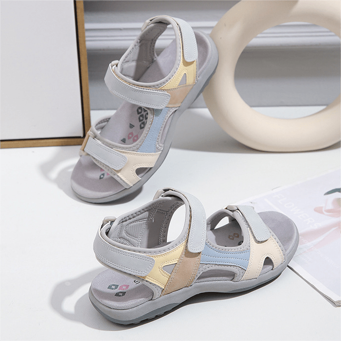Sandales confort femme, scratch ajustable, semelle antidérapante caoutchouc, tige respirante design moderne, vue de profil.