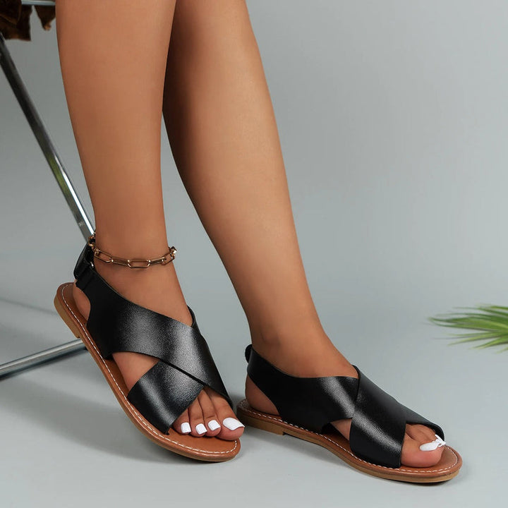 Sandales femme cuir, élégantes avec semelle confortable et lignes épurées, idéales pour tenues estivales et sorties décontrac