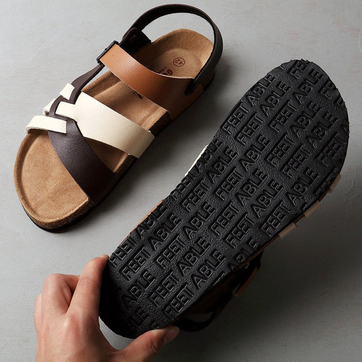 "Sandales femme en cuir marron sombre, élégantes et confortables, avec semelle rembourrée et design chic pour toute occasion.