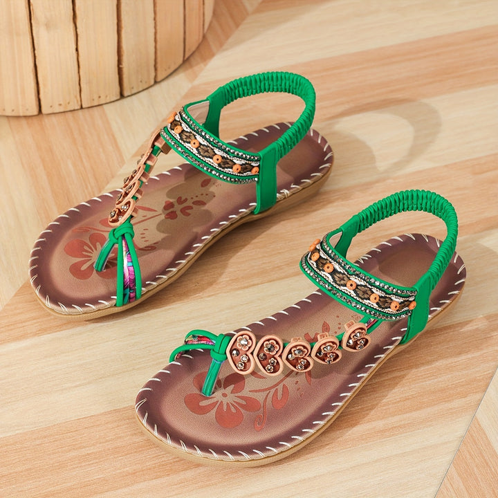 "Sandales Liliane modernes, confortables, semelle ergonomique pour femmes, style élégant en Bleu Océan et Vert Émeraude."