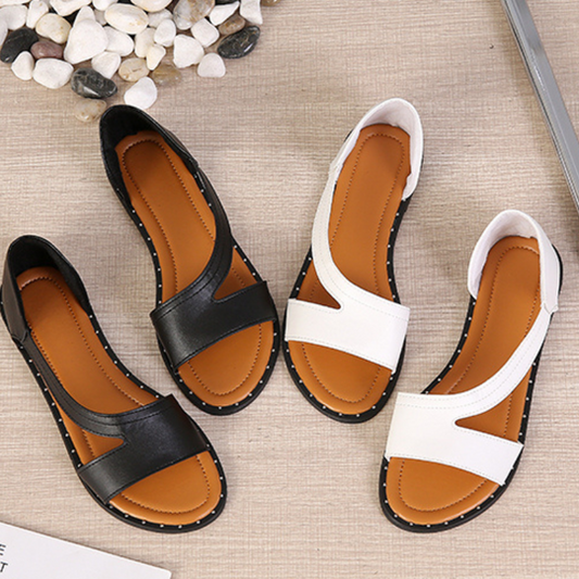 "Sandales orthopédiques de luxe pour femmes, cuir blanc et noir, design élégant et soutien confortable pour tous les jours."